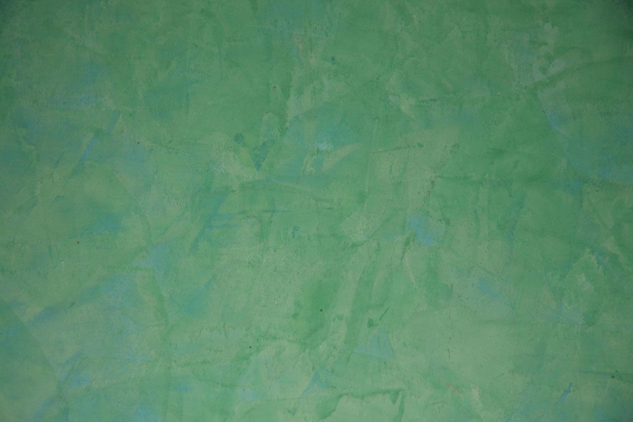 Grüner Marmorputz mit wolkiger Oberfläche